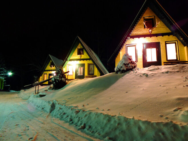 Bild 5 Ein romantischer Winterabend - unsere Finnhütten