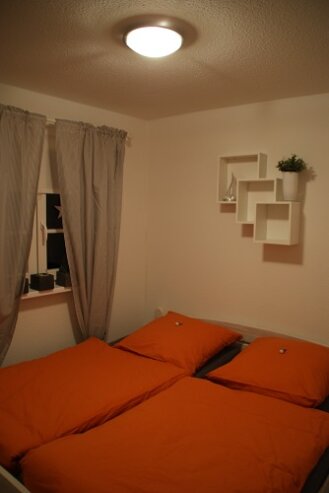 Bild 8 Schlafzimmer mit Doppelbett